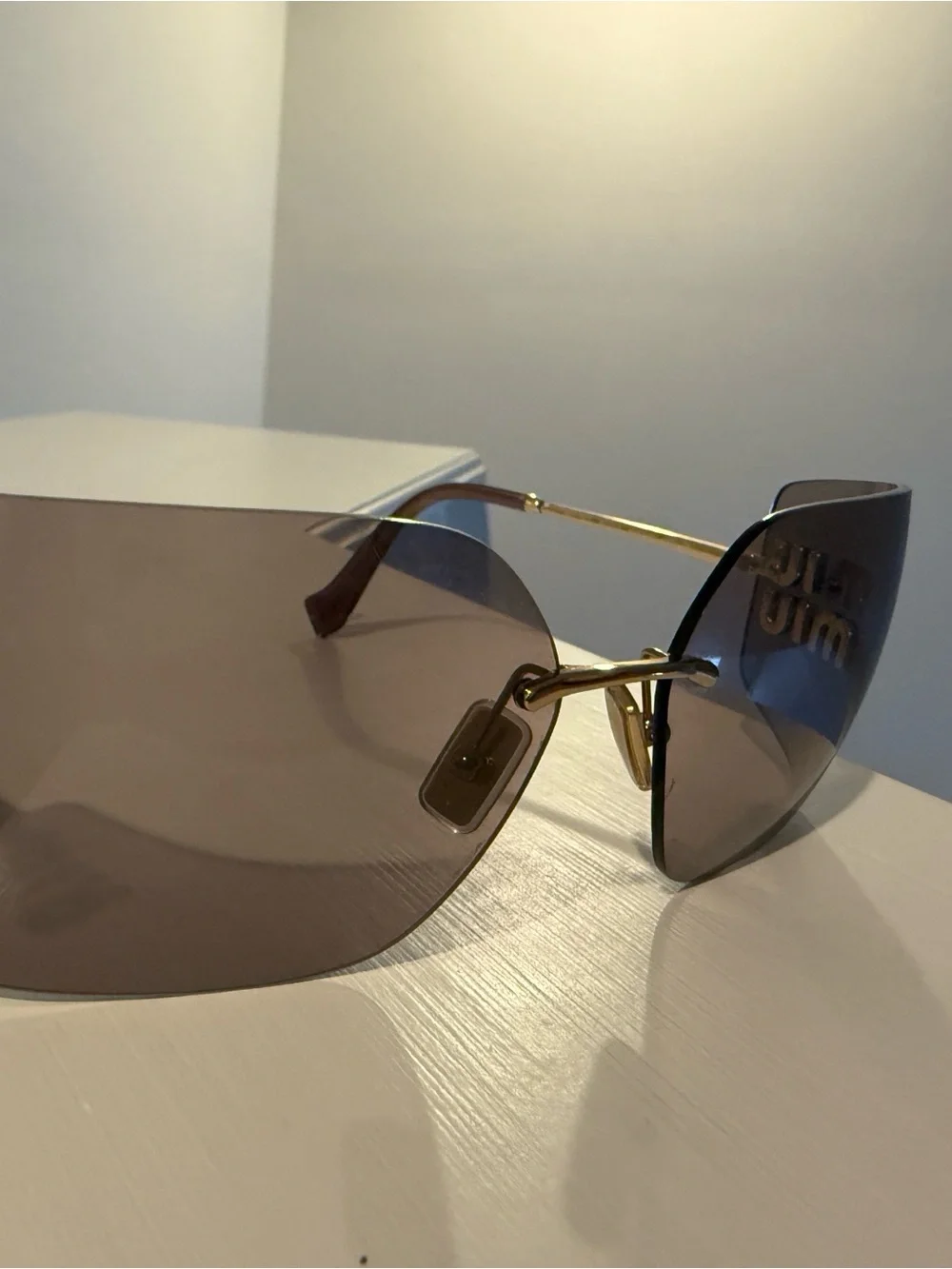 Miu Miu Gradient Pink Rimless Shield Sunglasses with Gold Logo